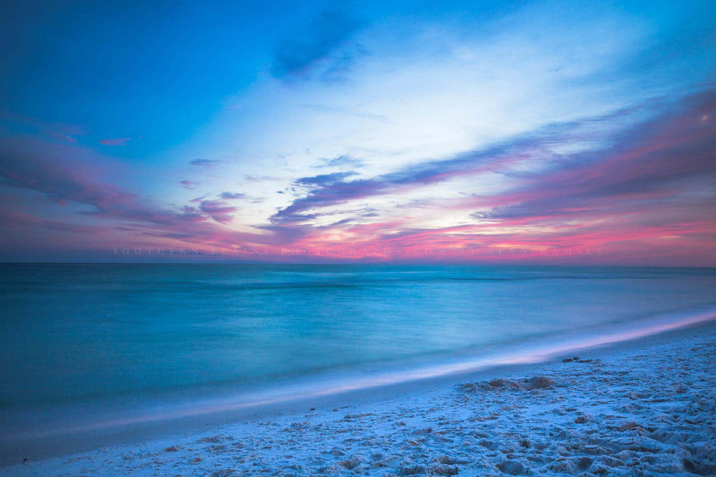 Seascape photography print of a scenic sunset over the Emerald Waters of the Gulf Coast along a beach near Destin, Florida by Sean Ramsey of Southern Plains Photography.