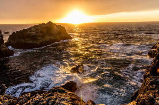Coastal photography print of waves crashing against rocks as a golden sunset takes place over the Pacific Ocean at Big Sur, California by Sean Ramsey of Southern Plains Photography.