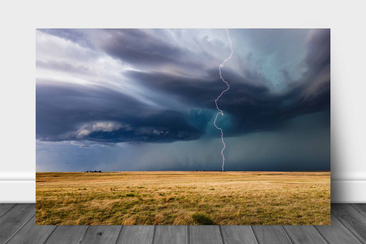 Storm aluminum metal print wall art of a lightning bolt winding its way to the ground from a supercell thunderstorm on a stormy day in Oklahoma by Sean Ramsey of Southern Plains Photography.