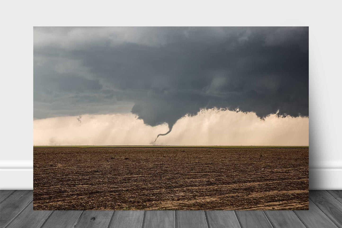 Storm aluminum metal print wall art of a tornado dancing in a dirt field on a stormy spring day in Kansas by Sean Ramsey of Southern Plains Photography.