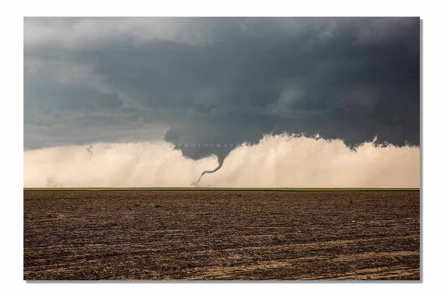 Storm photography print of a tornado dancing in a dirt field on a stormy spring day in Kansas by Sean Ramsey of Southern Plains Photography.