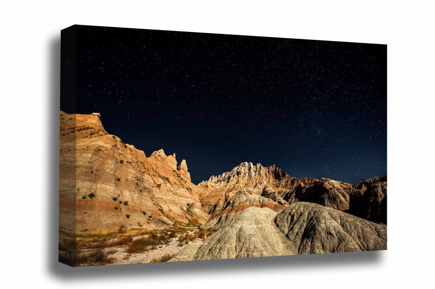 Great plains canvas wall art of a starry night sky over pinnacles in Badlands National Park, South Dakota by Sean Ramsey of Southern Plains Photography.