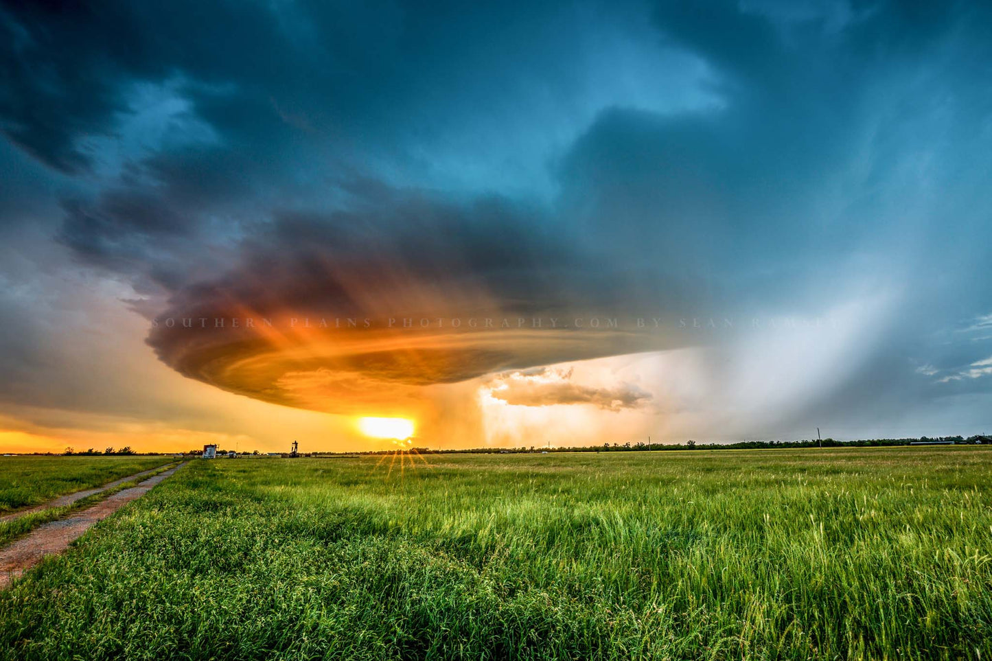 Storm photography print of a supercell thunderstorm illuminated by evening sunlight at sunset on a spring evening in Oklahoma by Sean Ramsey of Southern Plains Photography.