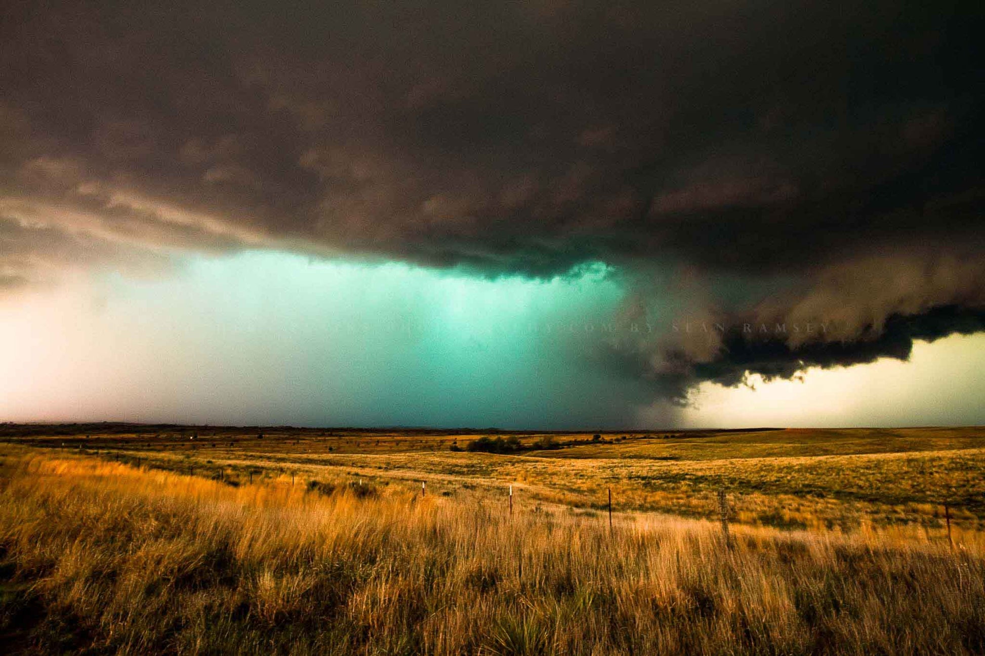 Storm photography print of a supercell thunderstorm with a teal hail core on a stormy spring day on the plains of the Texas panhandle by Sean Ramsey of Southern Plains Photography.