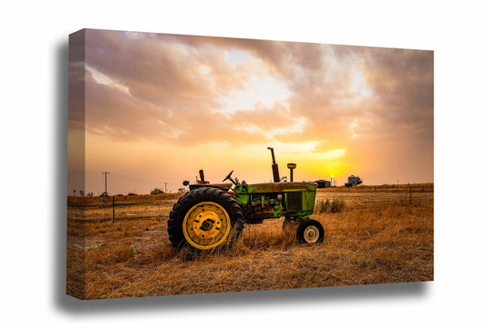 Rustic country gallery wrapped canvas wall art of a vintage tractor at sunset on a stormy evening in Texas by Sean Ramsey of Southern Plains Photography.
