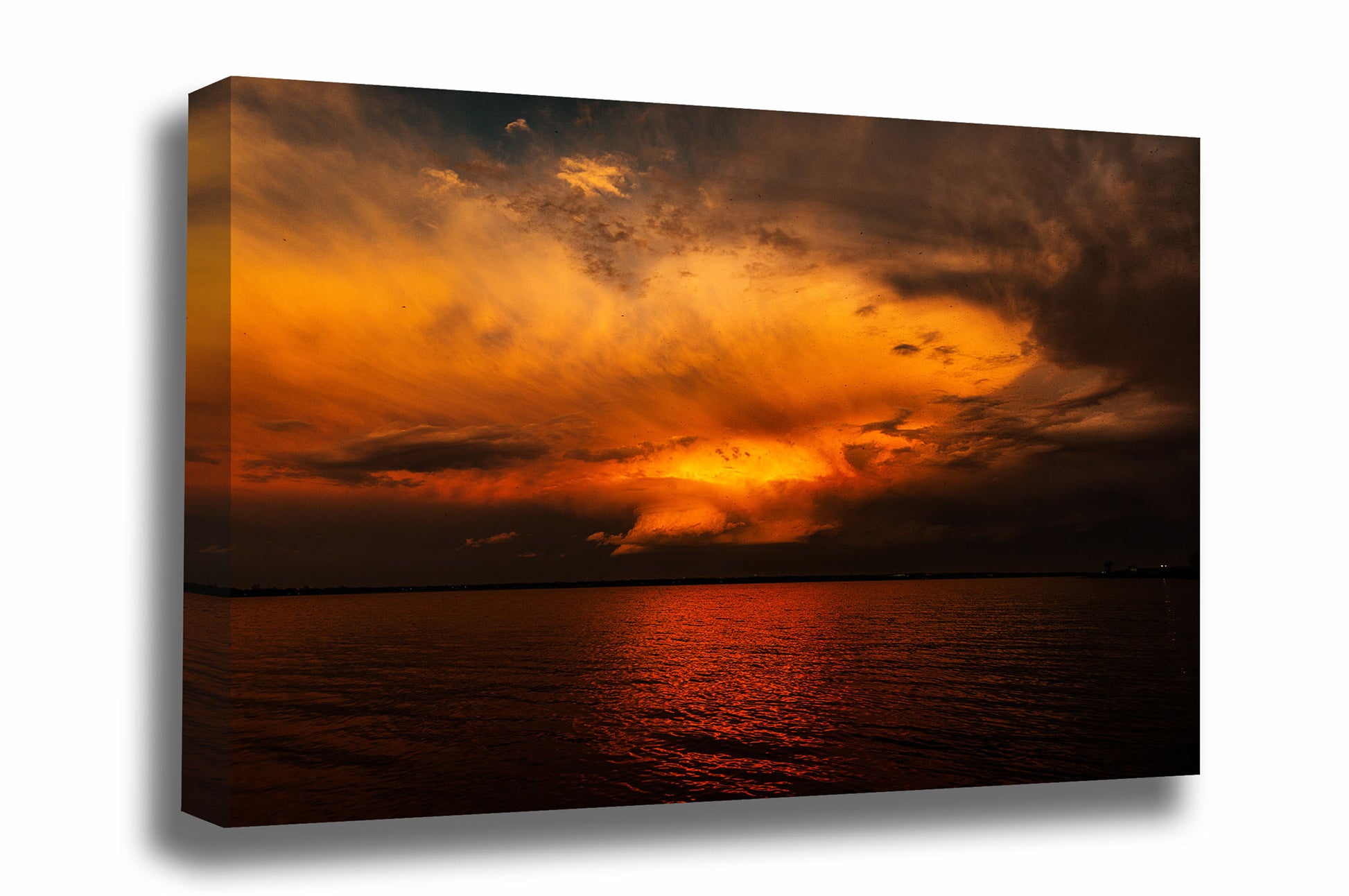Thunderstorm canvas wall art of a storm cloud illuminated by evening sunlight at sunset at Lake Overholser in Oklahoma City, Oklahoma by Sean Ramsey of Southern Plains Photography.