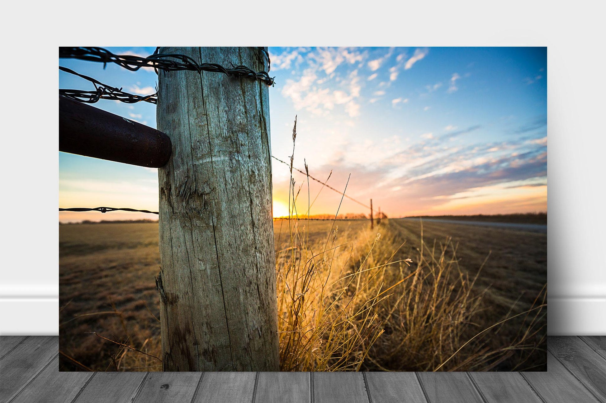 Country aluminum metal print wall art of a fence post and prairie grass illuminated by sunlight at sunset on a winter evening in Oklahoma by Sean Ramsey of Southern Plains Photography.