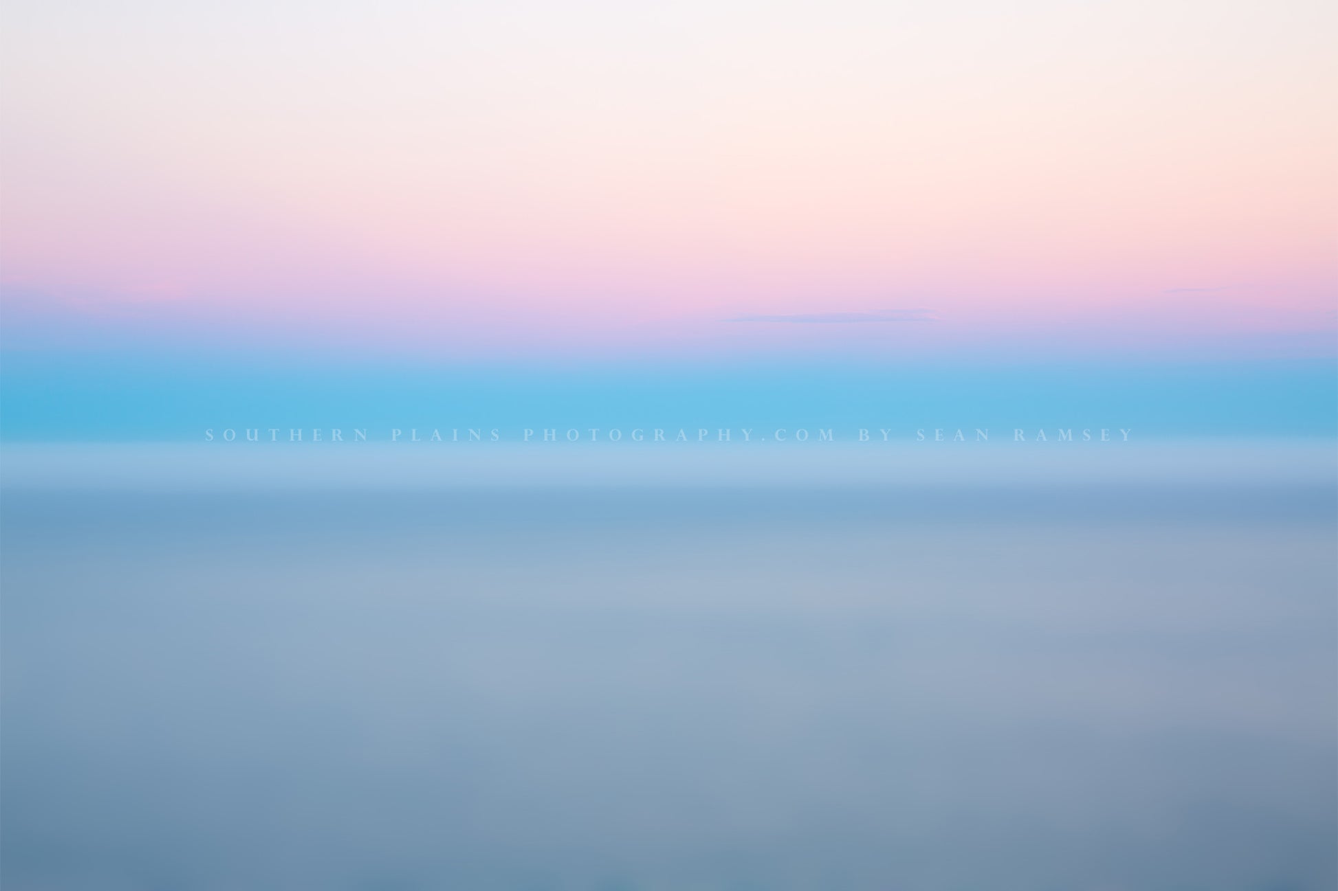 Blurry abstract photography print of a layer of fog over the Pacific Ocean at sunrise in Big Sur, California by Sean Ramsey of Southern Plains Photography.