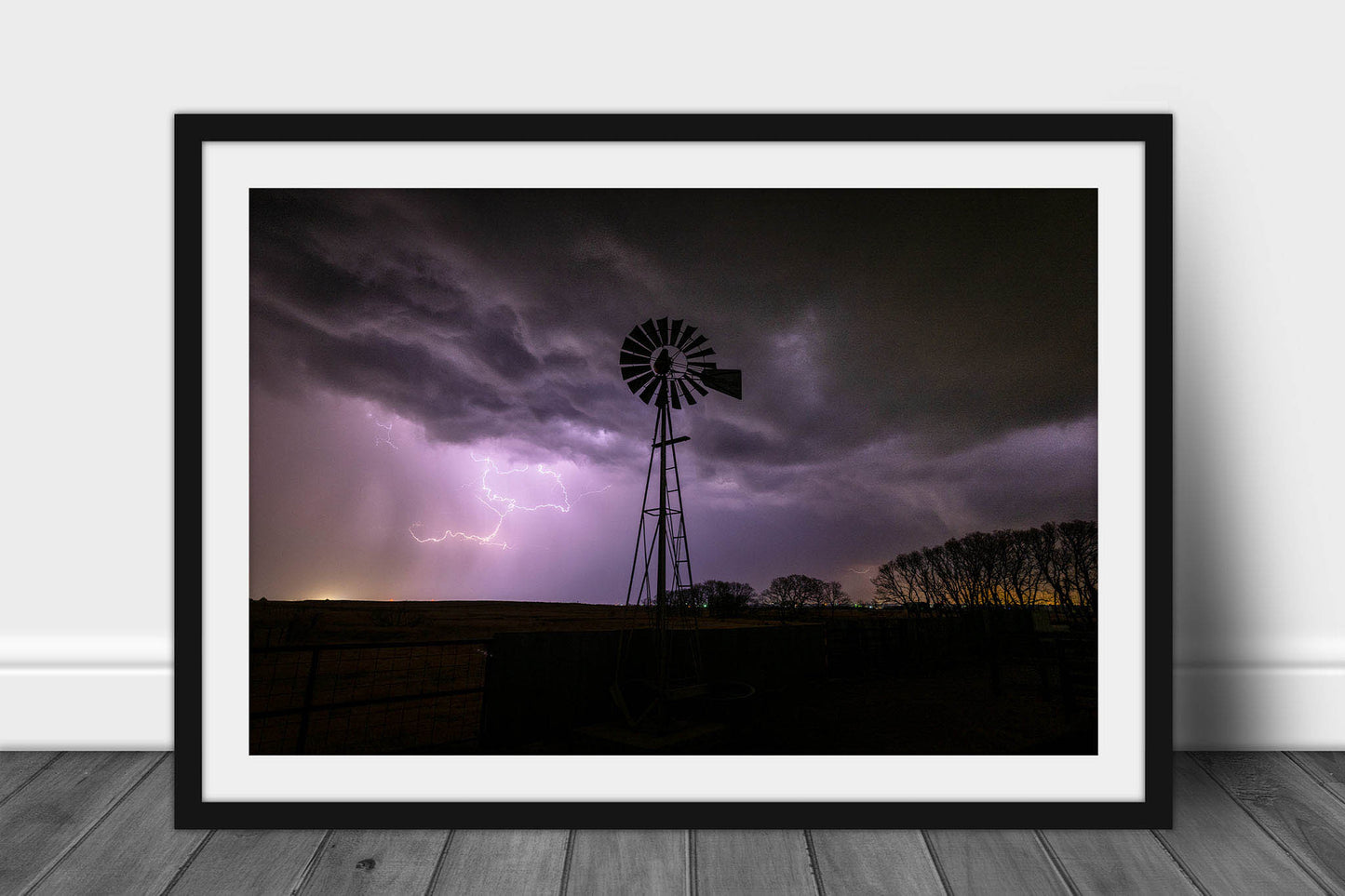 Framed and matted country print of an old windmill and lightning on a stormy night in Oklahoma by Sean Ramsey of Southern Plains Photography.