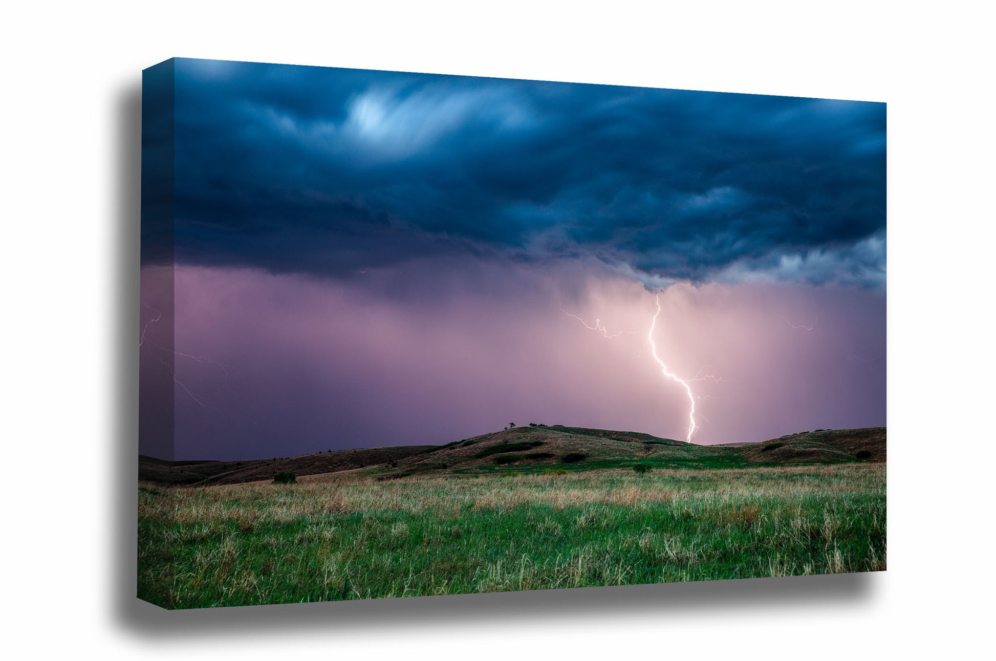 Storm canvas wall art of lightning striking near a hill on a stormy spring night on the plains of Kansas by Sean Ramsey of Southern Plains Photography.