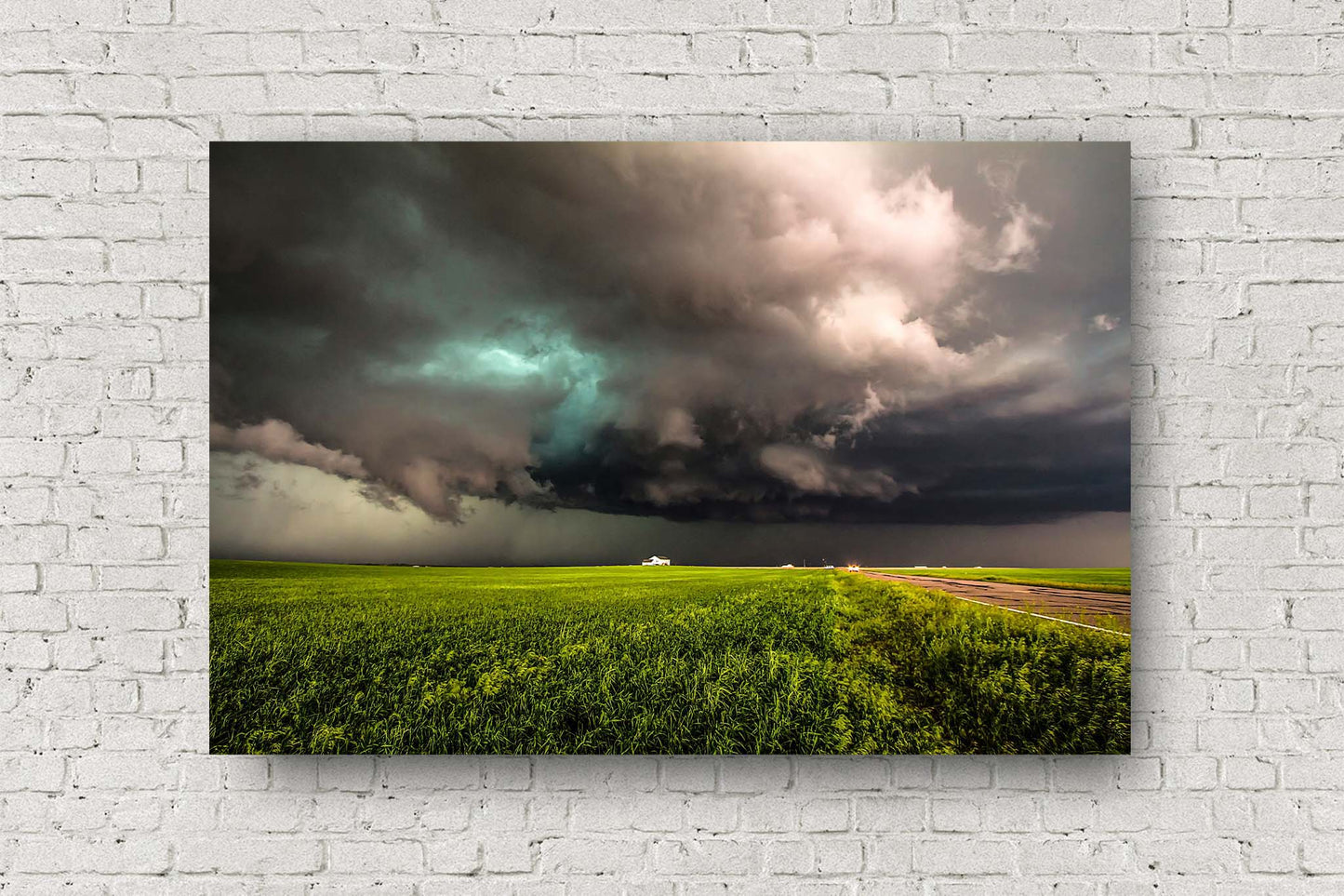 Storm metal print on aluminum of a thunderstorm twisting its way over a farmhouse on a stormy spring day on the plains of Colorado by Sean Ramsey of Southern Plains Photography.