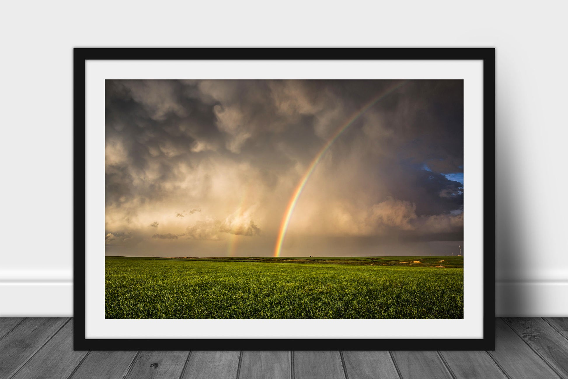 Framed and matted stormy sky print of a vibrant rainbow over open prairie on a spring day in Oklahoma by Sean Ramsey of Southern Plains Photography.