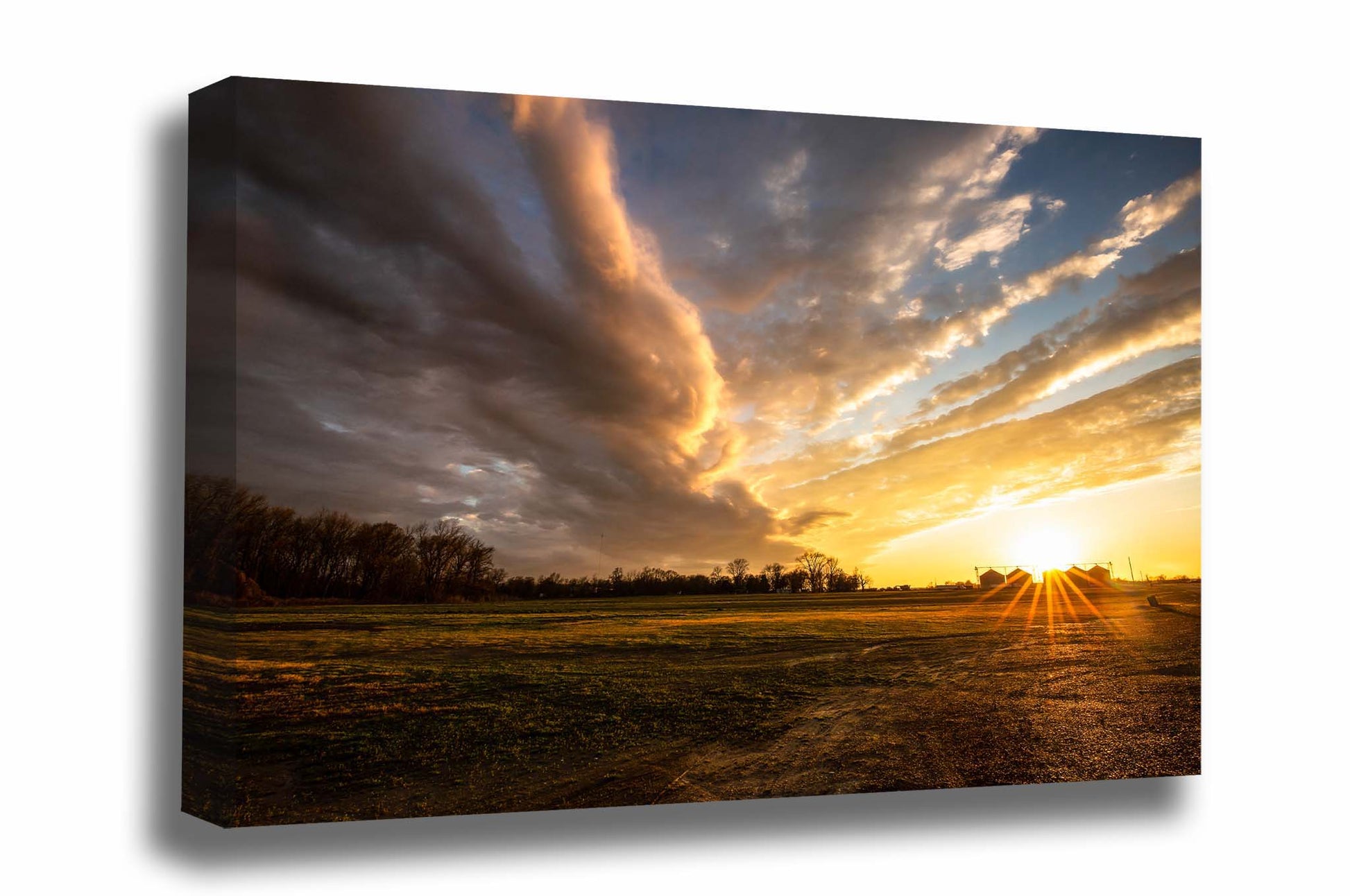 Southeastern canvas wall art of a warm sunset over a farm after a stormy day in the Mississippi Delta in Mississippi by Sean Ramsey of Southern Plains Photography.