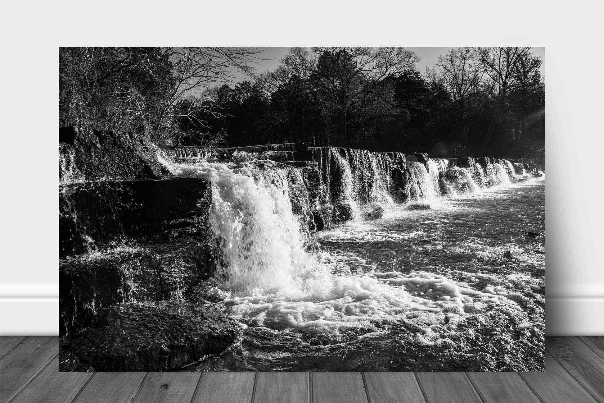 Black and white waterfall aluminum metal print of Mountain Fork Creek crossing over the rock ledges of Natural Dam Falls on a winter day in the Ozark Mountains of Arkansas by Sean Ramsey of Southern Plains Photography.