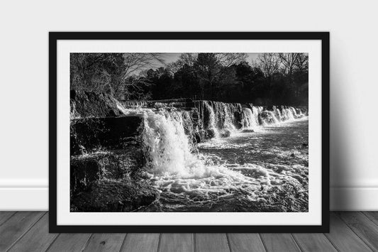 Framed and matted black and white waterfall print of Mountain Fork Creek crossing over the rock ledges of Natural Dam Falls on a winter day in the Ozark Mountains of Arkansas by Sean Ramsey of Southern Plains Photography.
