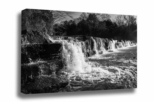Black and white waterfall canvas wall art of Mountain Fork Creek crossing over the rock ledges of Natural Dam Falls on a winter day in the Ozark Mountains of Arkansas by Sean Ramsey of Southern Plains Photography.