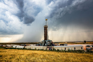 Oilfield photography print of a storm passing behind a drilling rig on a summer day in Oklahoma by Sean Ramsey of Southern Plains Photography.