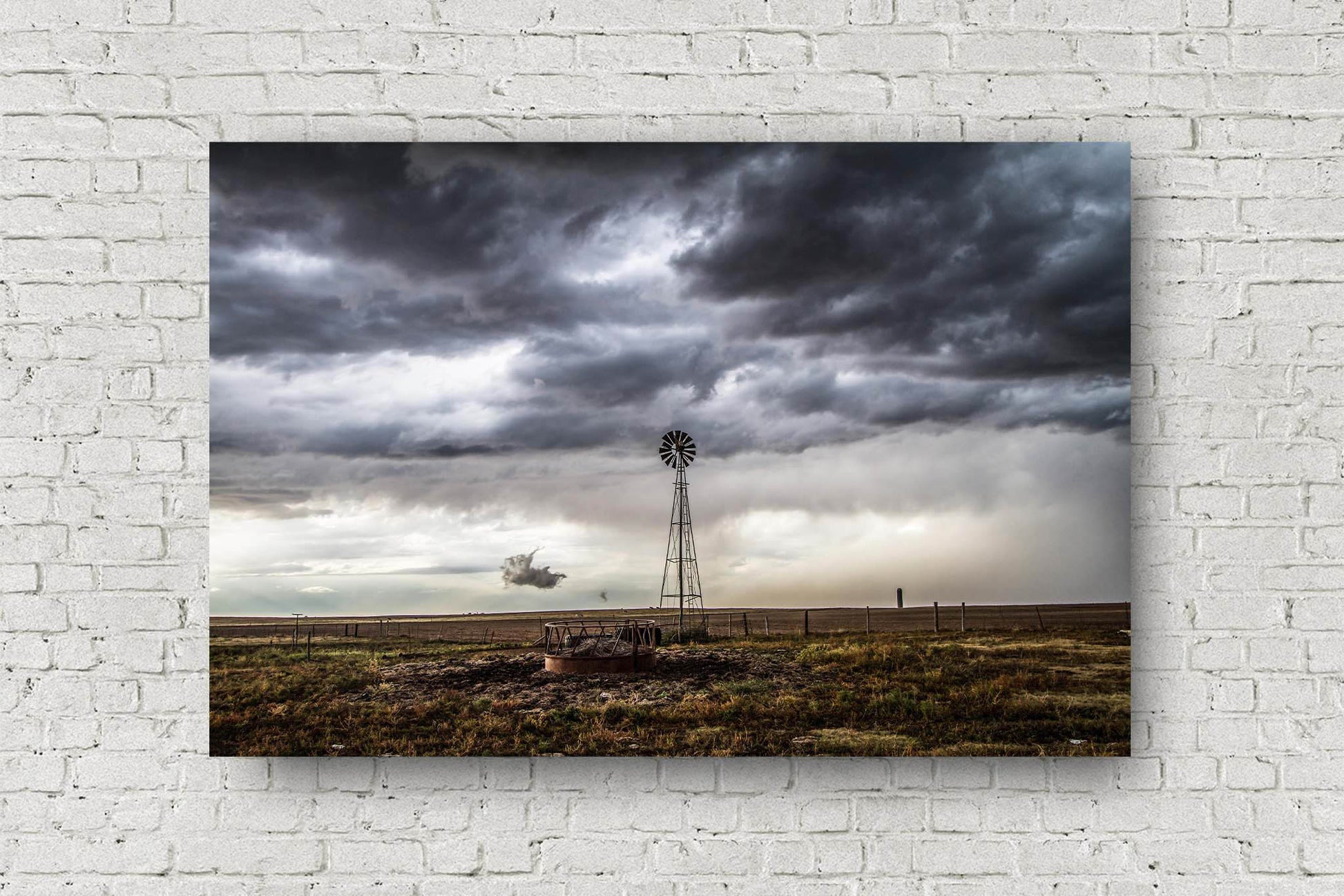 Country aluminum metal print wall art of an old windmill underneath a stormy sky on a spring day in the Oklahoma panhandle by Sean Ramsey of Southern Plains Photography.