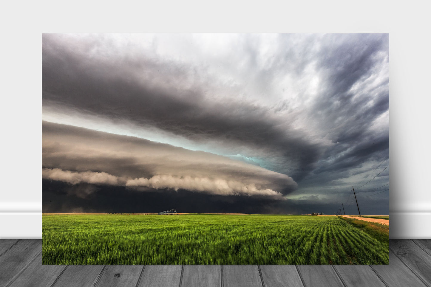 Storm aluminum metal print wall art of a supercell thunderstorm shelf cloud over a green field on a stormy spring day in Kansas by Sean Ramsey of Southern Plains Photography.