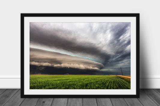 Framed storm print of a supercell thunderstorm shelf cloud over a green field on a stormy spring day in Kansas by Sean Ramsey of Southern Plains Photography.