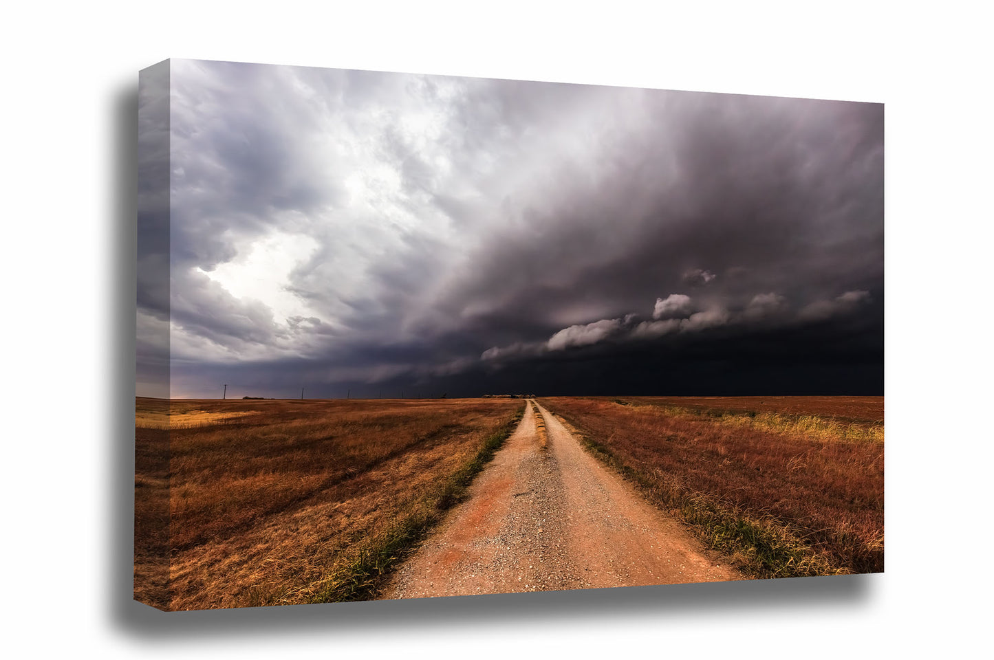Storm gallery wrapped canvas wall art of a dirt road leading to a thunderstorm as it advances over open plains in Oklahoma by Sean Ramsey of Southern Plains Photography.