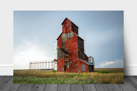 Farm aluminum metal print wall art of an old red wooden grain elevator on the plains of Texas by Sean Ramsey of Southern Plains Photography.