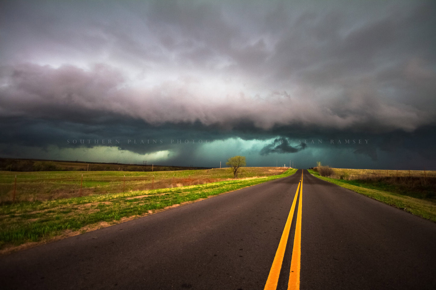 Storm photography print of a highway leading to an intense thunderstorm on a stormy evening in Oklahoma by Sean Ramsey of Southern Plains Photography.
