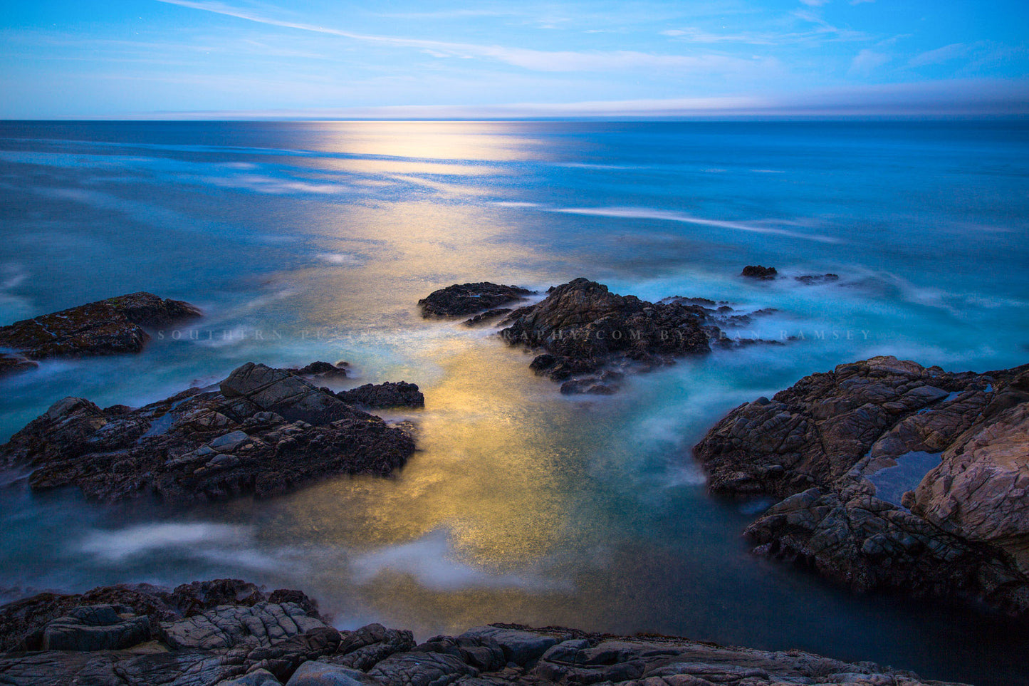 Coastal photography print of moonlight reflecting off the Pacific Ocean at sunrise at Big Sur near Monterey, California by Sean Ramsey of Southern Plains Photography.