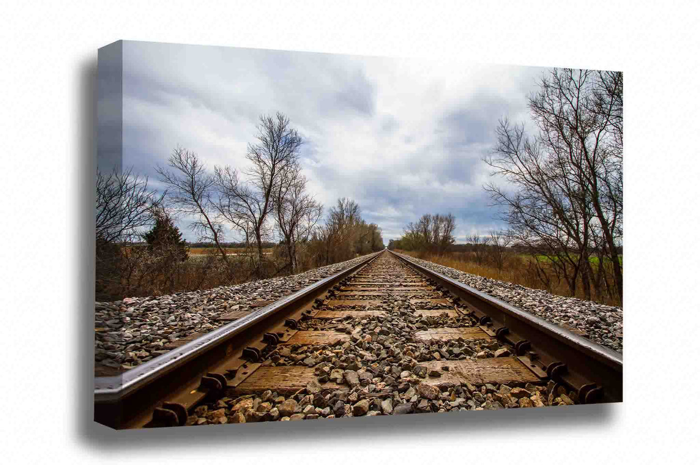 Railroad canvas wall art of looking down railroad tracks to a stormy sky and adventure ahead on a spring day in Oklahoma by Sean Ramsey of Southern Plains Photography.