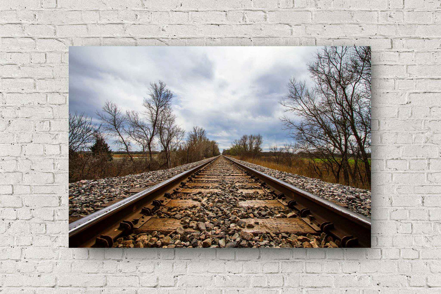 Railroad metal print on aluminum of railroad tracks leading to a stormy sky on a spring day in Oklahoma by Sean Ramsey of Southern Plains Photography.
