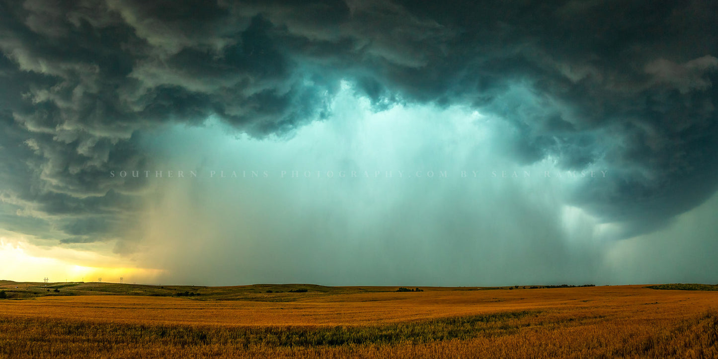 Panoramic storm photography print of a supercell thunderstorm with intense rain and hail over a field on a spring day in Oklahoma by Sean Ramsey of Southern Plains Photography.