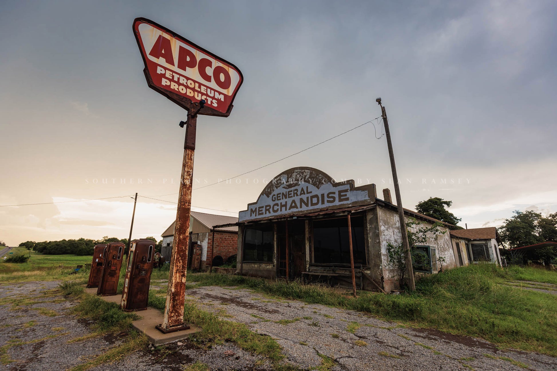 Rural Americana photography print of an abandoned roadside gas station on a stormy evening in Oklahoma by Sean Ramsey of Southern Plains Photography.