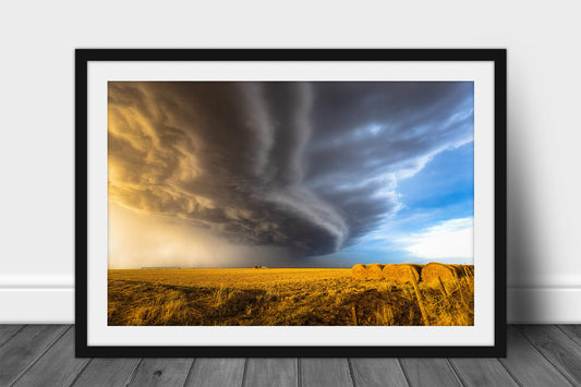 Framed and matted storm print of a thunderstorm advancing over a farm in the Oklahoma Panhandle by Sean Ramsey of Southern Plains Photography.