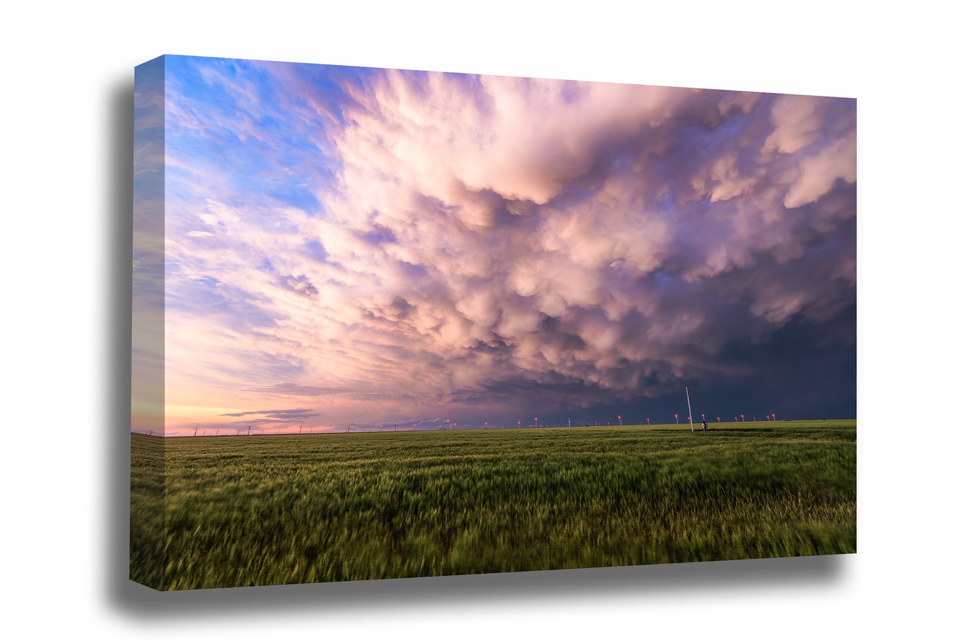 Stormy sky gallery wrapped canvas wall art of mammatus storm clouds over a wheat field at sunset on a stormy spring evening in Texas by Sean Ramsey of Southern Plains Photography.