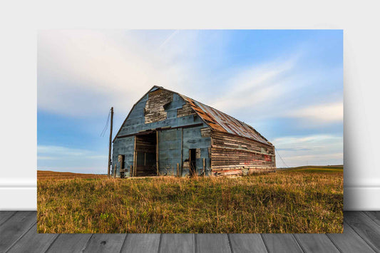 Rural Midwest aluminum metal print wall art of an old barn covered by a patchwork of tin in the Nebraska Sandhills by Sean Ramsey of Southern Plains Photography.