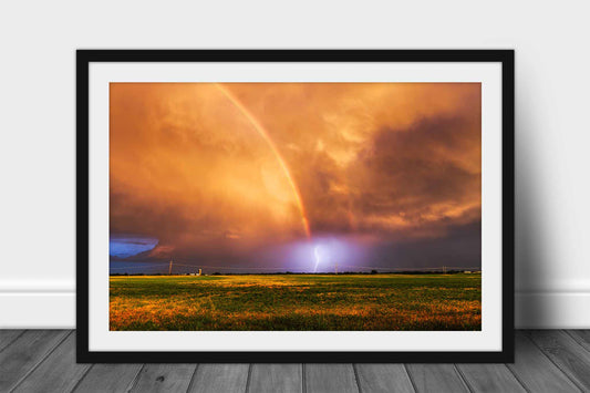 Framed and matted storm print of a lightning bolt at the end of a brilliant rainbow at sunset on a stormy summer evening in Oklahoma by Sean Ramsey of Southern Plains Photography.