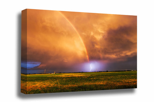 Weather canvas wall art of a lightning strike at the end of a rainbow at sunset on a stormy evening in Oklahoma by Sean Ramsey of Southern Plains Photography.