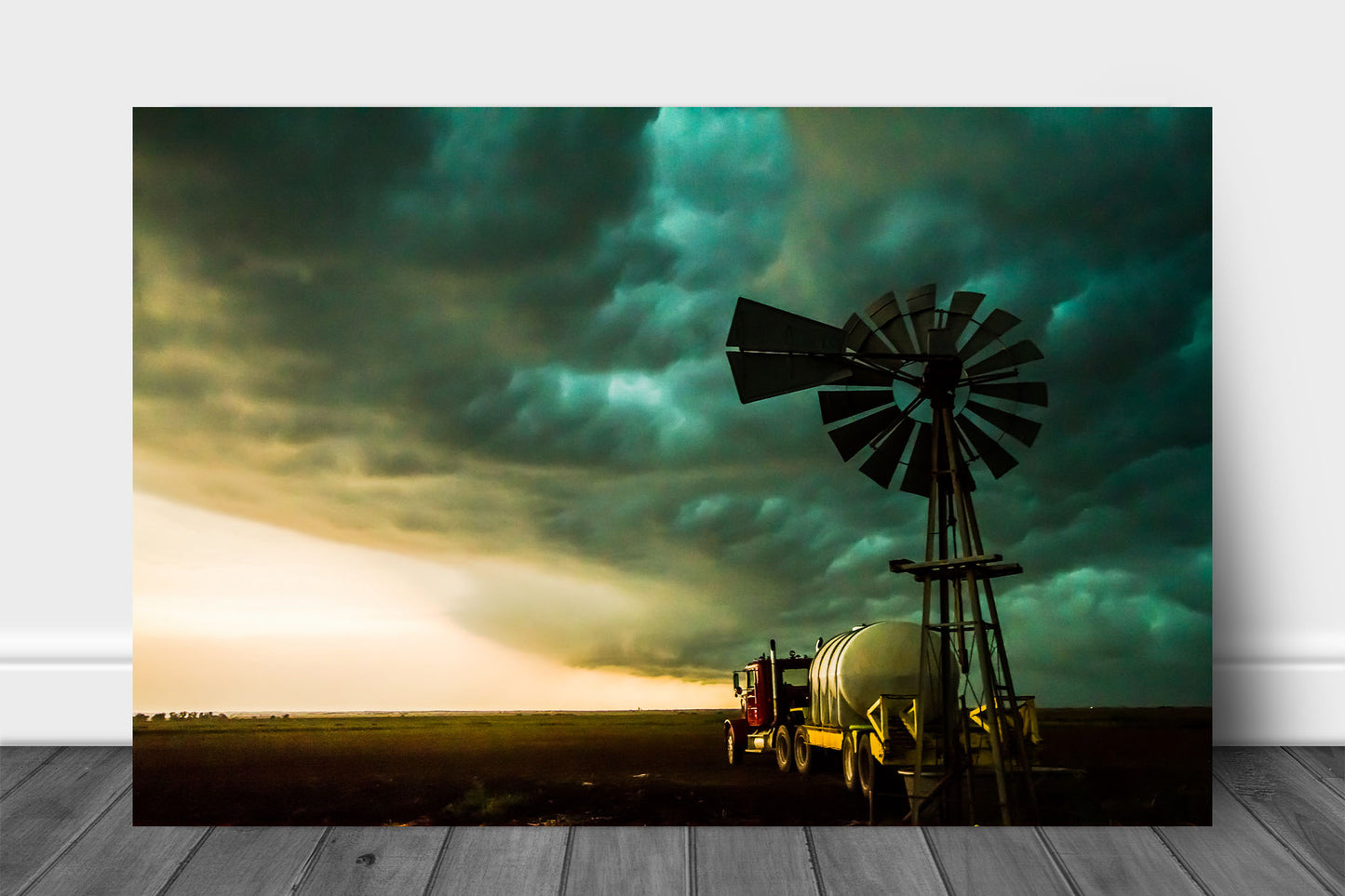 Country metal print of a thunderstorm advancing over an old windmill and truck on a stormy summer day in Oklahoma by Sean Ramsey of Southern Plains Photography.