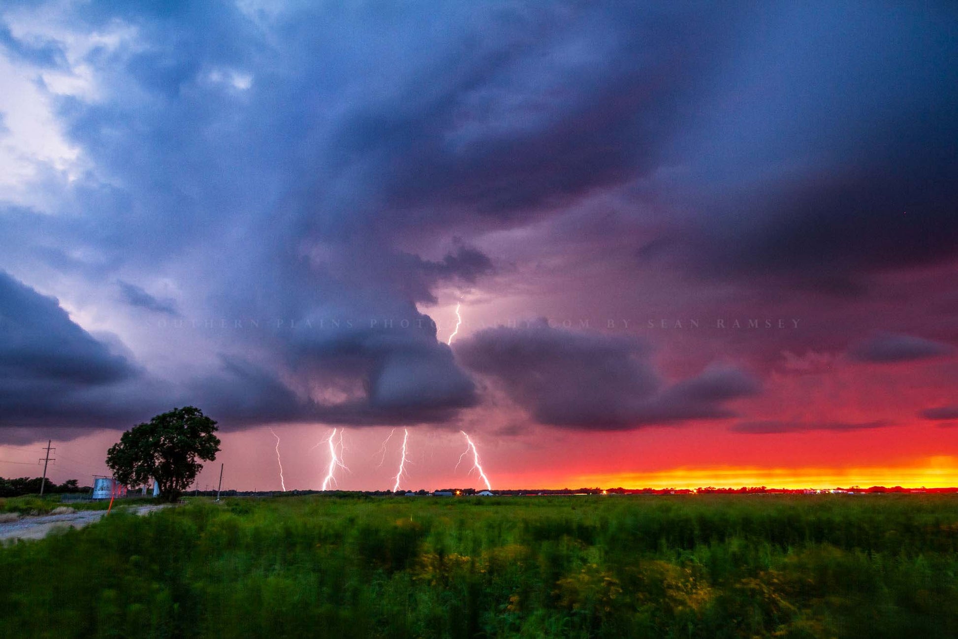 Storm photography print of multiple lightning bolts striking during a summer thunderstorm at sunset on a stormy evening in Oklahoma by Sean Ramsey of Southern Plains Photography.