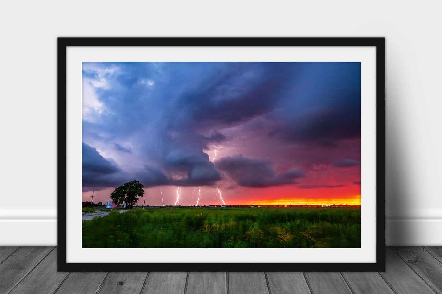 Framed and matted storm photography print of multiple lightning strikes at sunset on a stormy summer evening in Oklahoma by Sean Ramsey of Southern Plains Photography.