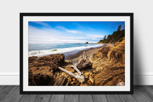 Framed and matted Pacific Northwest coastal print of driftwood logs resting on the shore along a beach in Washington state by Sean Ramsey of Southern Plains Photography.