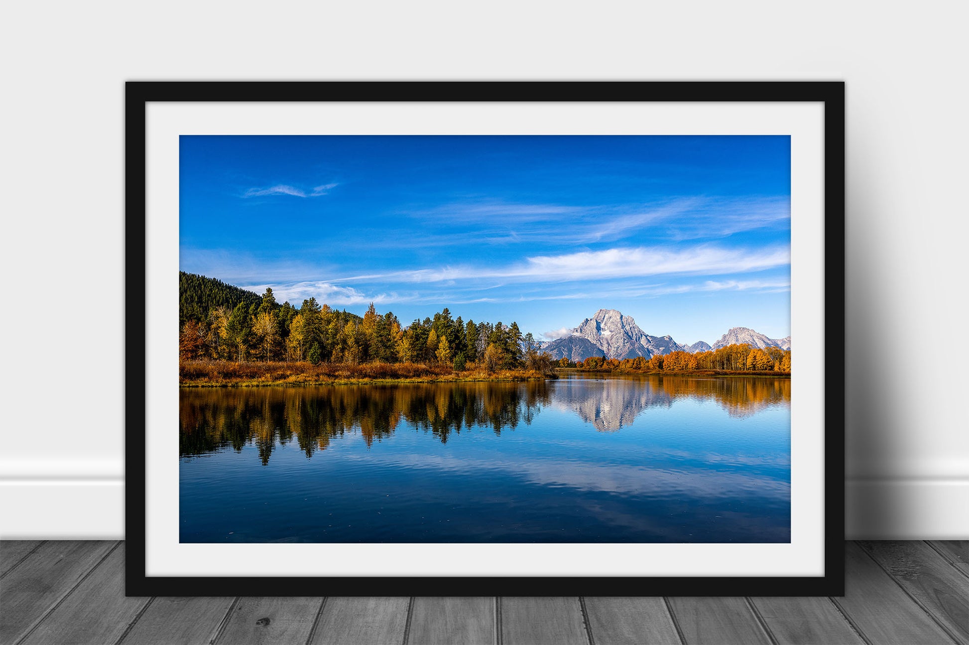 Framed and matted Rocky Mountain print of Mount Moran reflecting off the waters of the Snake River at Oxbow Bend on an autumn morning in Grand Teton National Park, Wyoming by Sean Ramsey of Southern Plains Photography.