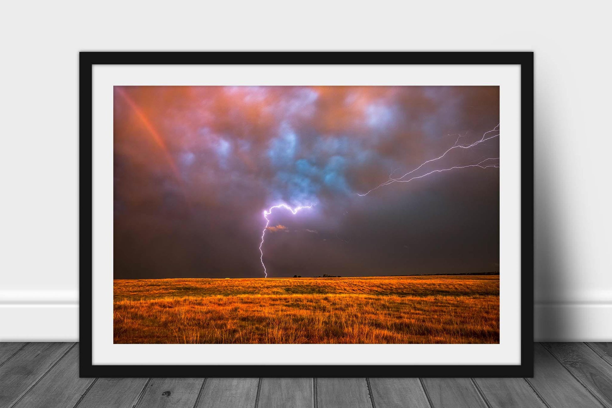 Framed storm print of lightning spanning the sky over open prairie at sunset on a stormy evening in Oklahoma by Sean Ramsey of Southern Plains Photography.