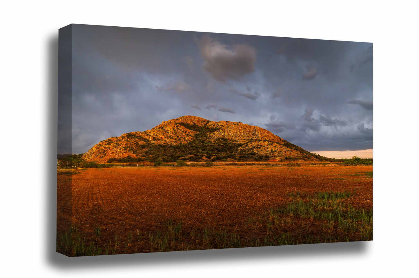 Landscape gallery wrapped canvas wall art of the Quartz Mountains rising abruptly over a field as a thunderstorm passes overhead in southwest Oklahoma by Sean Ramsey of Southern Plains Photography.