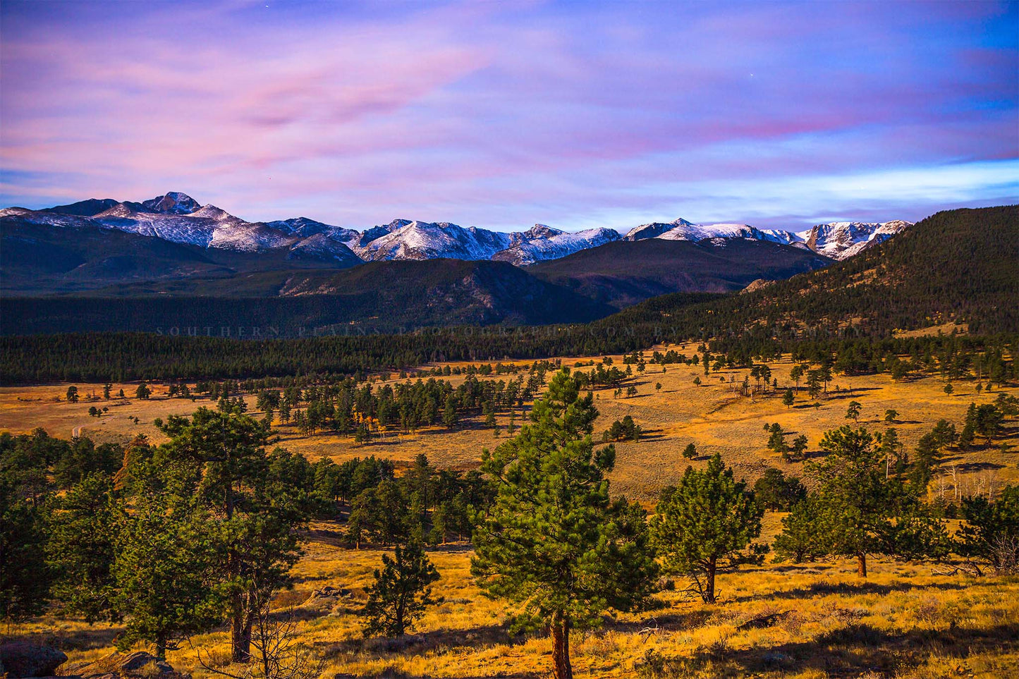 Rocky Mountains photography print of snowy peaks overlooking a valley at dusk near Estes Park, Colorado by Sean Ramsey of Southern Plains Photography.