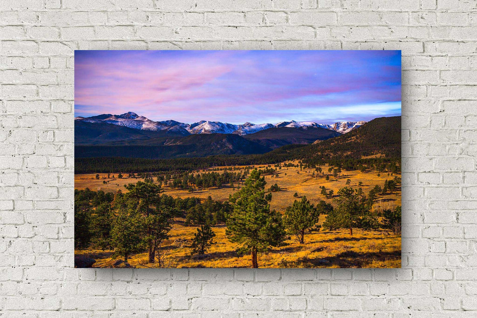 Rocky Mountain metal print wall art on aluminum of snow-capped peaks overlooking a mountain valley at dusk near Estes Park, Colorado by Sean Ramsey of Southern Plains Photography.