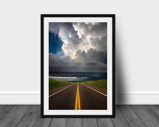 Framed and matted storm print of a supercell thunderstorm over a highway on a stormy spring day in Kansas by Sean Ramsey of Southern Plains Photography.
