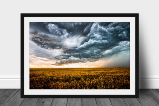 Framed western print with optional mat of storm clouds churning over an amber wheat field on a stormy spring day on the plains of Colorado by Sean Ramsey of Southern Plains Photography.