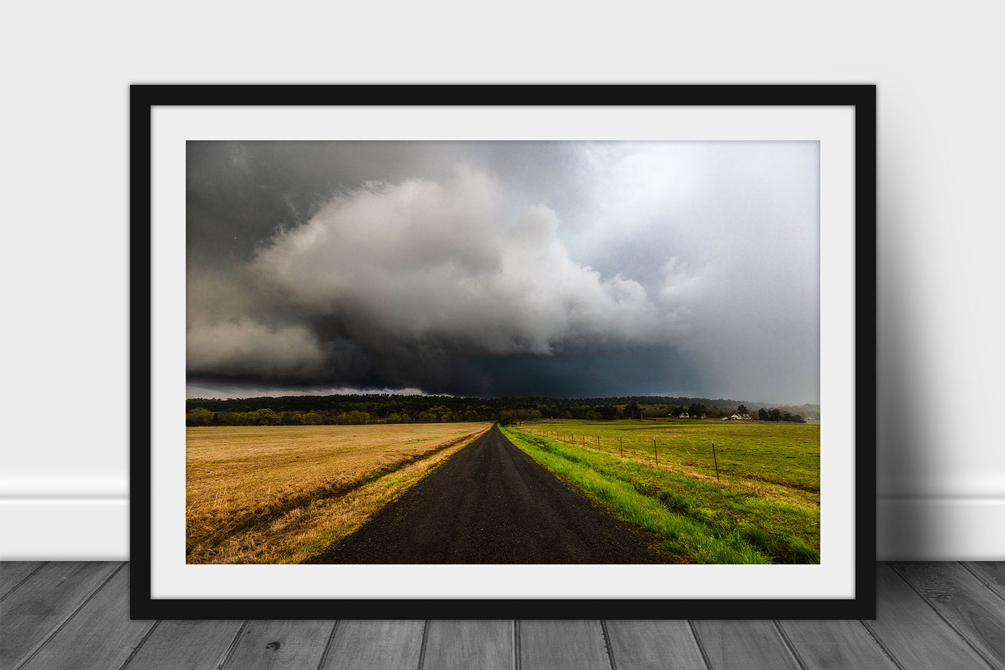 Thunderstorm framed print of a road leading to ominous storm clouds over hills in the Ouachita Mountains in Arkansas by Sean Ramsey of Southern Plains Photography.