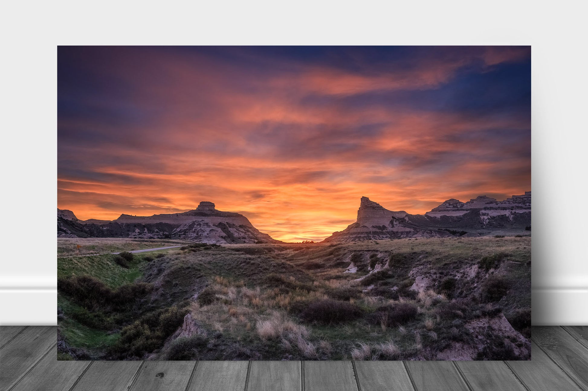 Prairie aluminum metal print wall art of a vivid sunset taking place over Scotts Bluff National Monument near Scottsbluff, Nebraska by Sean Ramsey of Southern Plains Photography.